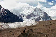 10 Trekking On The Upper Baltoro Glacier Towards Shagring Camp With Baltoro Kangri And Kondus Peak.jpg